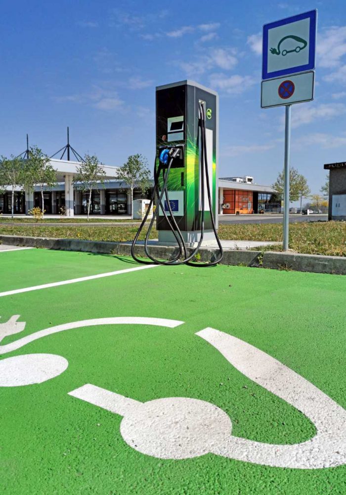 ev-charging-station-on-parking-lot-parking-space-g-FL54TNK.jpg